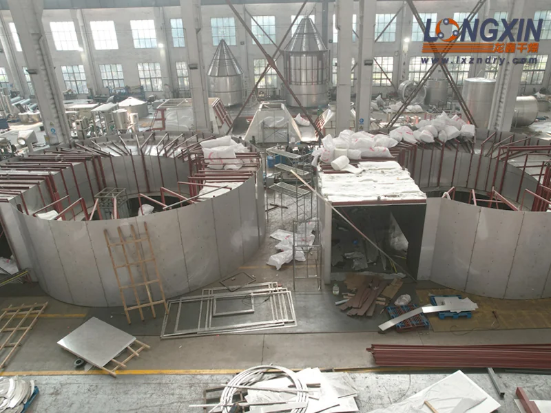 Large spray dryer vessels in Longxin’s manufacturing workshop