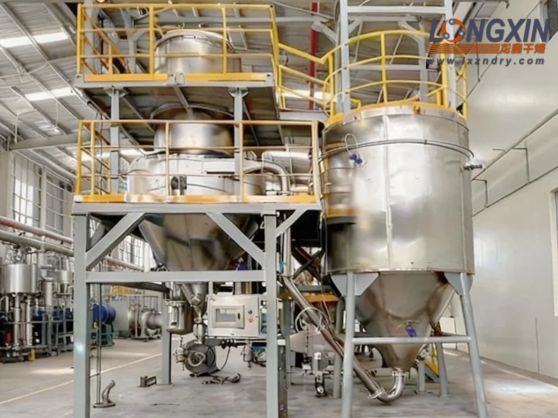 BLPG-100 closed-loop spray dryer with stainless steel vessels and yellow railings