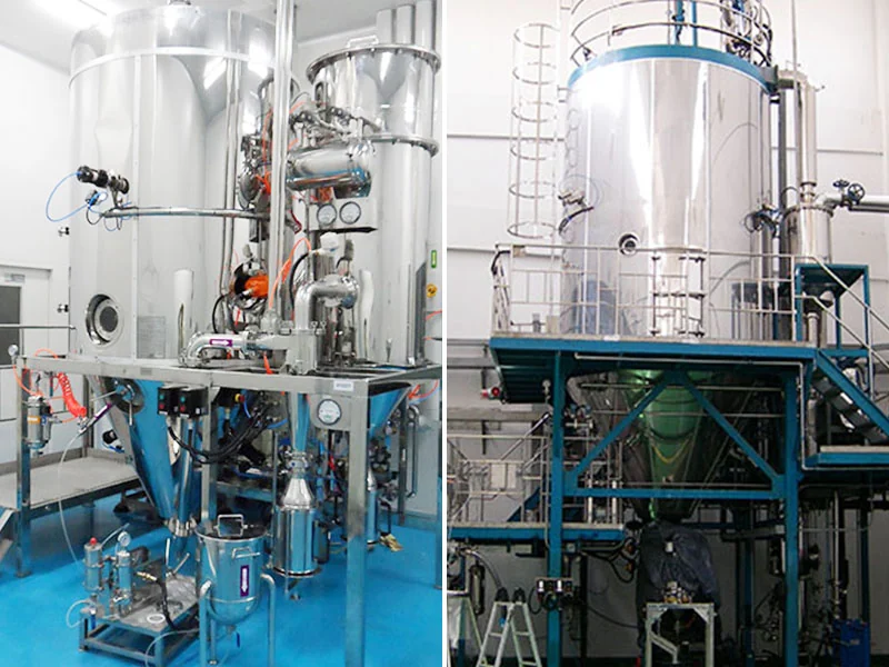 HC spray drying installation with stainless steel vessels and a blue support frame
