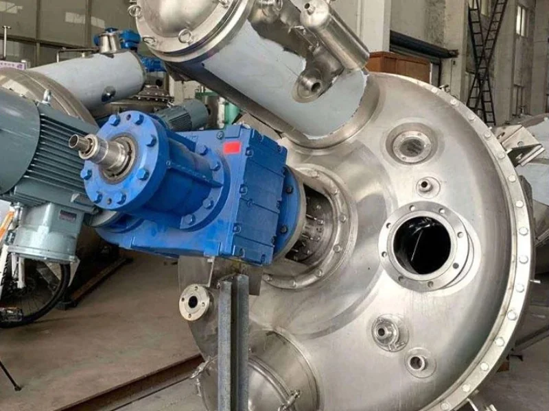 Conical screw dryer top cover with blue geared motor and process connections