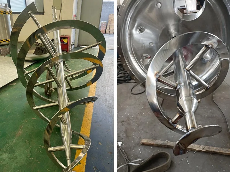 Internally heated helical agitator and hollow shaft assembly for a conical vacuum dryer
