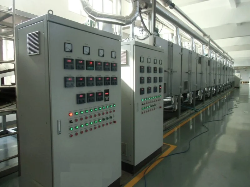 Control panels and drying chambers of a belt dryer for nuts and seeds
