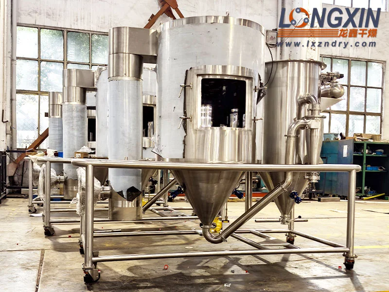 Front view of the laboratory spray drying chamber with the access hatch open