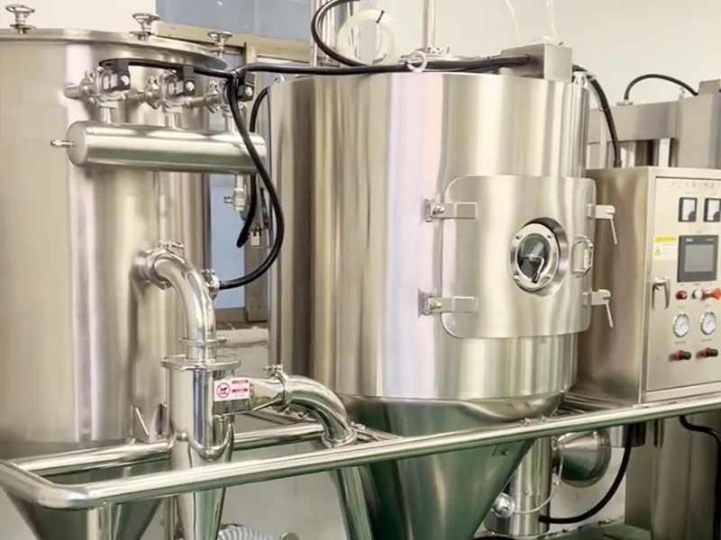 Polished laboratory drying chamber with cyclone separator, piping and controls