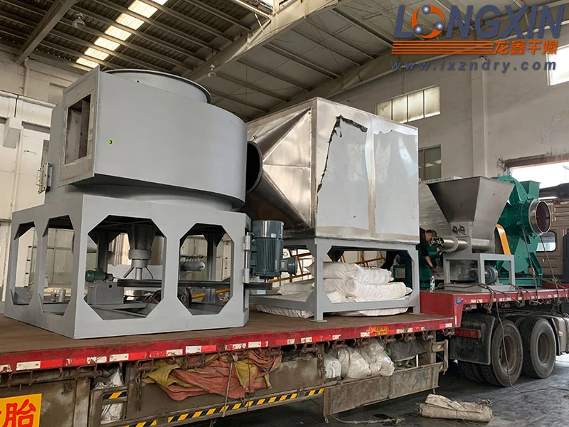 Spin flash dryer main units secured on a flatbed truck for shipment