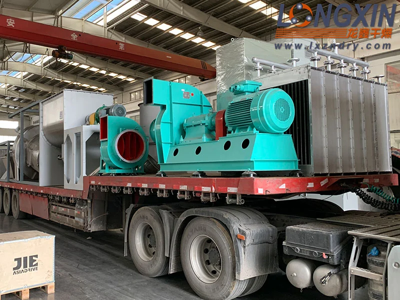 Process fans for a spin flash drying system loaded for delivery