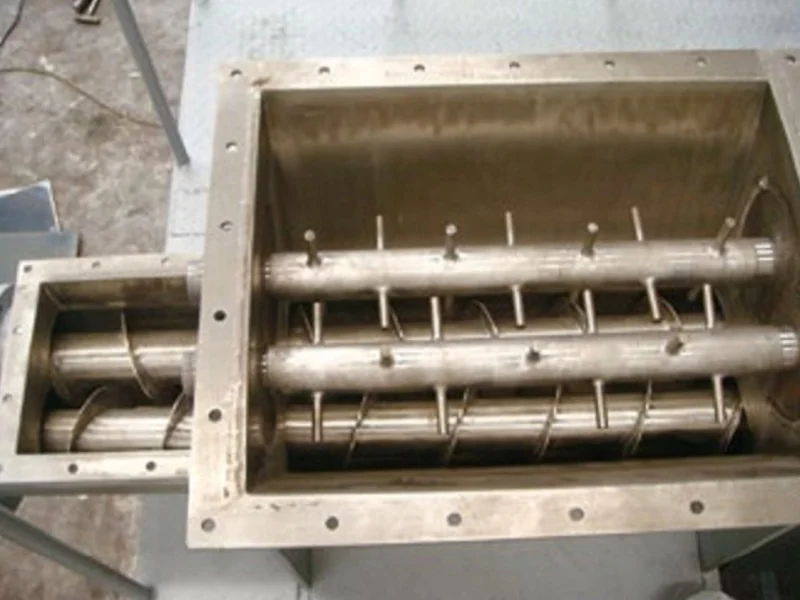 Open view of the screw feeding mechanism for a spin flash dryer