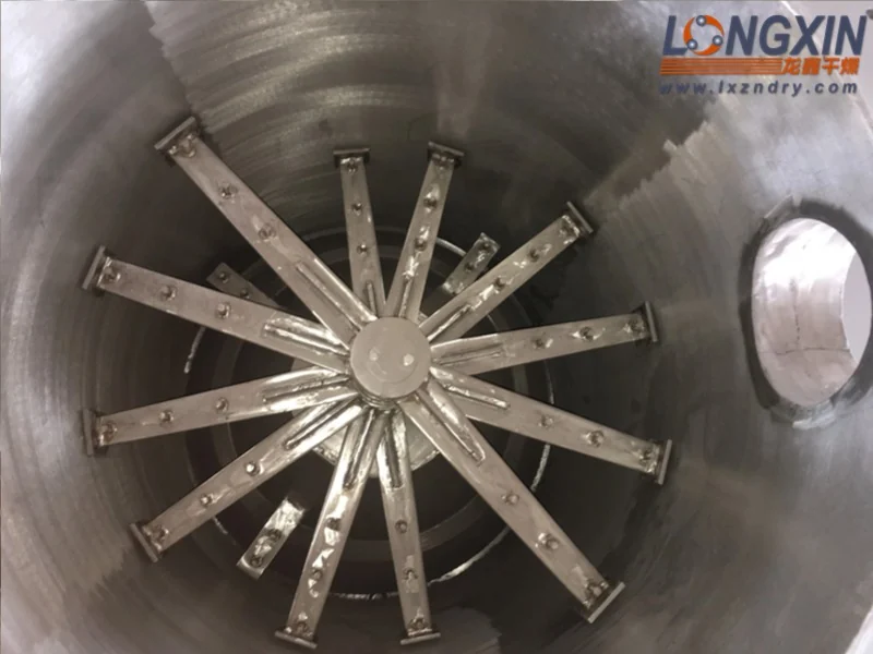 Multi-blade disintegrator assembly inside an XSG spin flash drying chamber