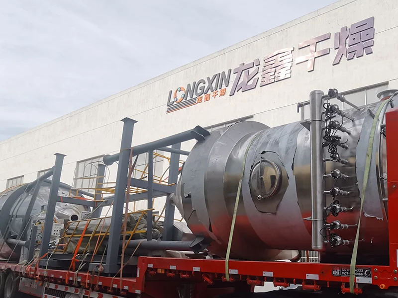 Two-fluid nozzle spray drying equipment for producing fine droplets from liquid feed.
